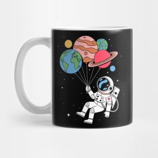 Astronaut Holding Planet Balloons Mug